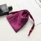 Purple satin drawstring pouch for small jewelry, gathered top with ribbon ties.