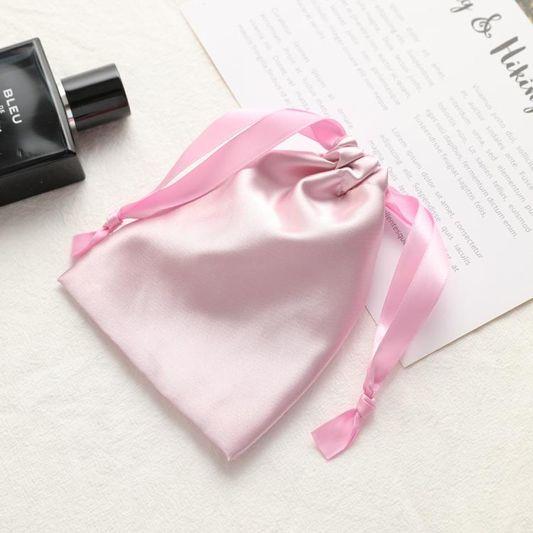 Small satin drawstring jewelry pouch, light pink satin with ribbon ties