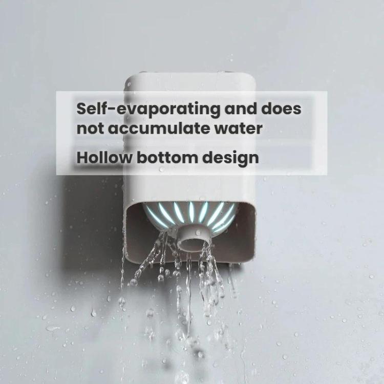 Toilet brush holder base showing water droplets dripping from the bottom