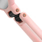 Pink mirror hinge detail with black clamp and gold screws on handle