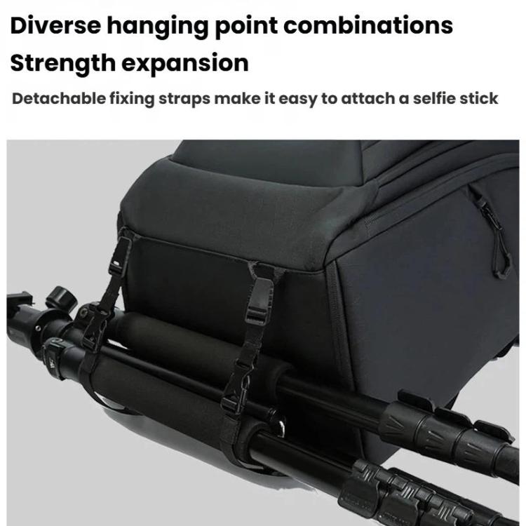 Black camera backpack with adjustable fixing straps for attaching gear.