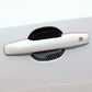 Carbon fiber anti-scratch door cup protector sticker on car door handle area