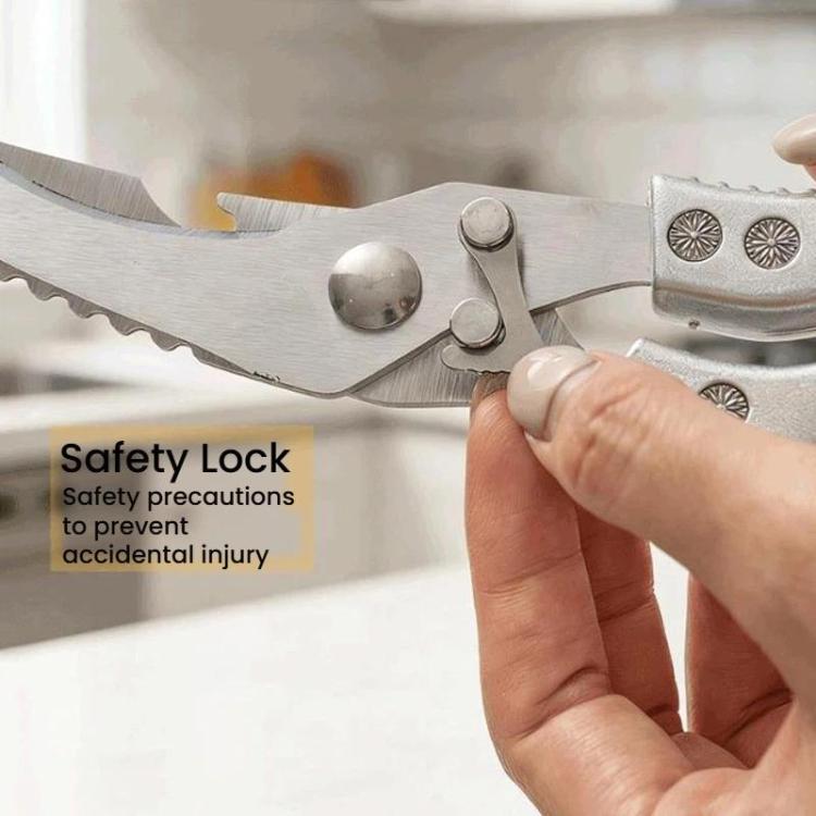 Kitchen shears with safety lock and scalloped serrated cutting edges