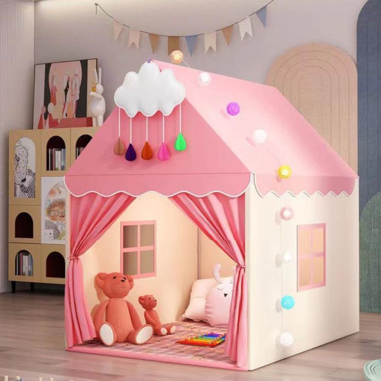 Pink kids indoor play tent with peaked roof, scalloped curtains, window openings, cloud decor