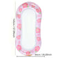 Inflatable floating bed lounger with pink flower pattern and white mesh center