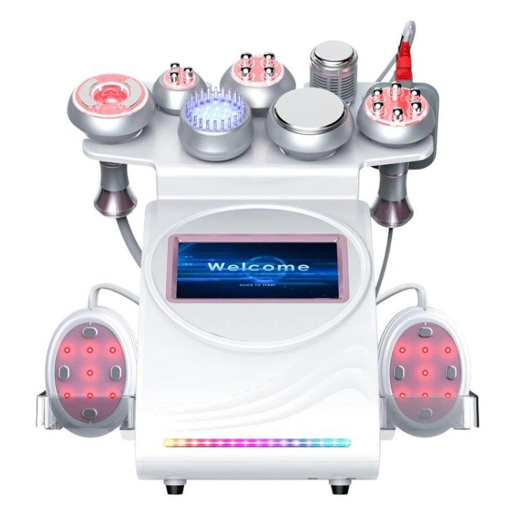White beauty massage device with curved body, tool heads, and red LED indicators