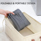 Gray striped foldable mesh storage bag with carry handles and open top