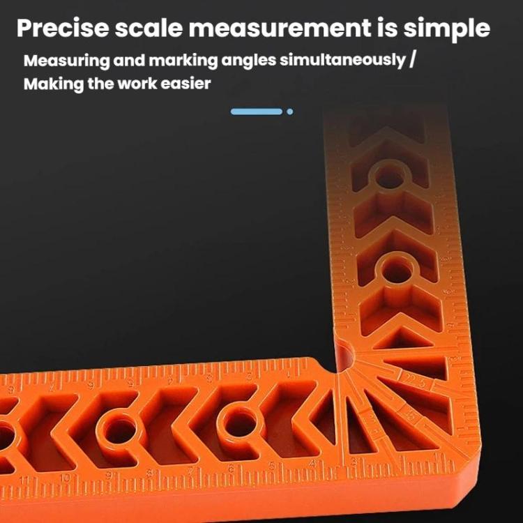 Orange L-shaped corner ruler with engraved scale lines and round alignment holes.