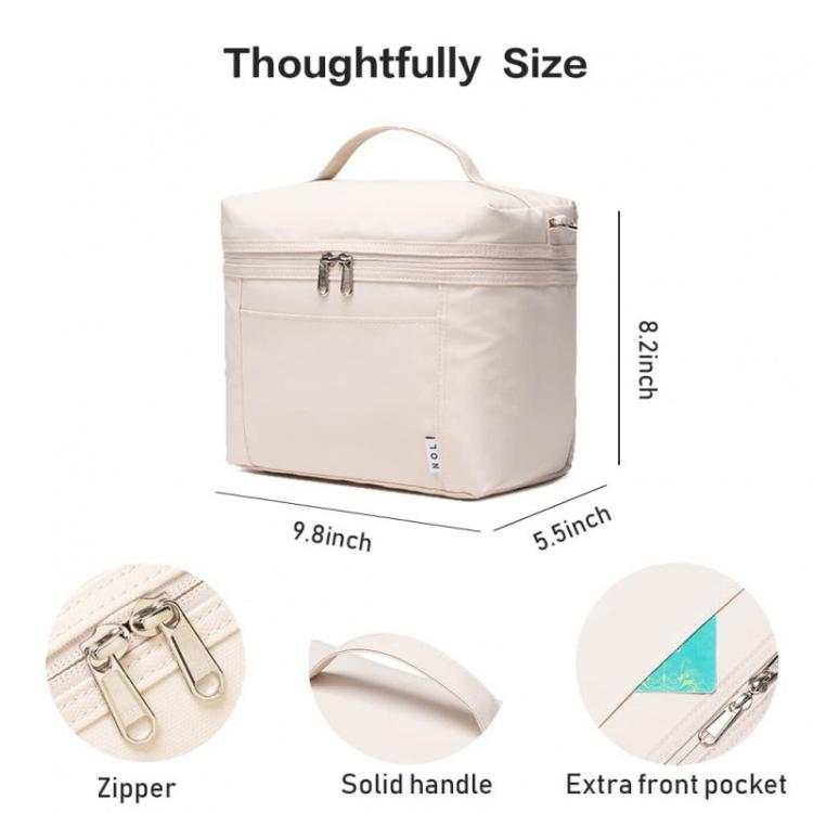 Light beige insulated lunch bag with top handle, front zipper, and front pocket