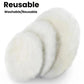 Stacked round white wool polishing pads, long-pile buffing wheels