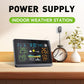 Indoor weather station on a shelf with color LCD display and connected outdoor sensor