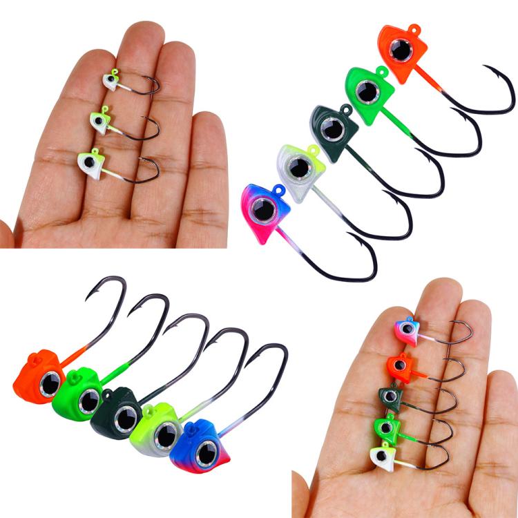 Micro triangle jig head hooks shown in hand, assorted colors with black hooks