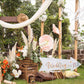 White wedding arrow yard sign on two stakes with 'Wedding' lettering