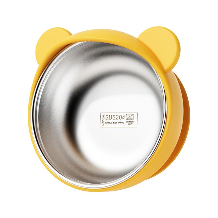 Yellow silicone toddler feeding bowl with 304 stainless steel inner and suction base.