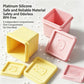 Pink and yellow silicone baby food storage ice tray with separate molded compartment lids