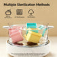 Silicone baby food ice trays with lids in a sterilizing steamer-style setup
