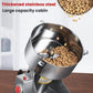 Large stainless steel grain hopper grinder with visible beans inside drum