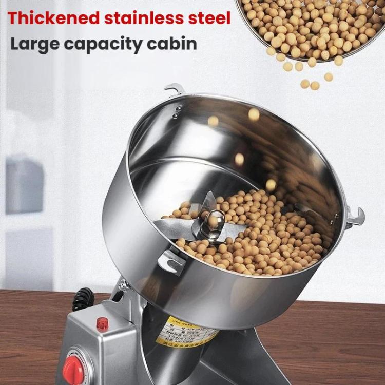 Large stainless steel grain hopper grinder with visible beans inside drum