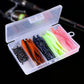 Soft plastic crankbait lure and hook set in clear tackle box, mixed orange, green, pink