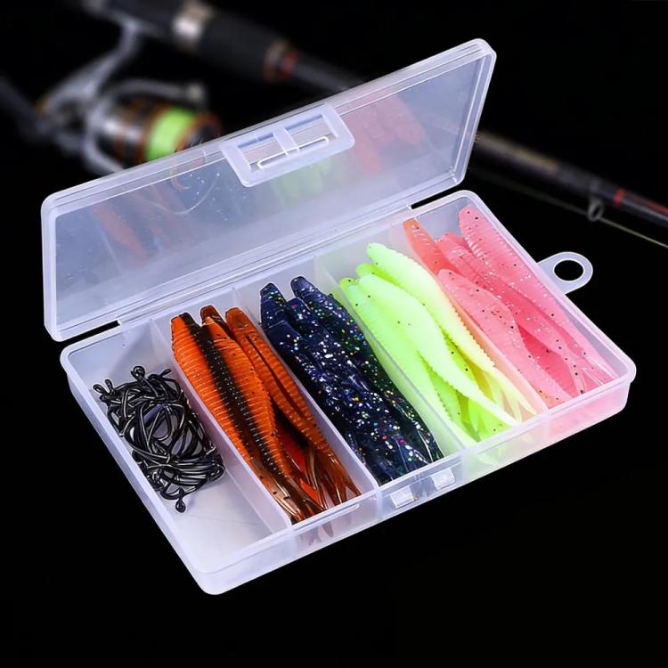 Soft plastic crankbait lure and hook set in clear tackle box, mixed orange, green, pink