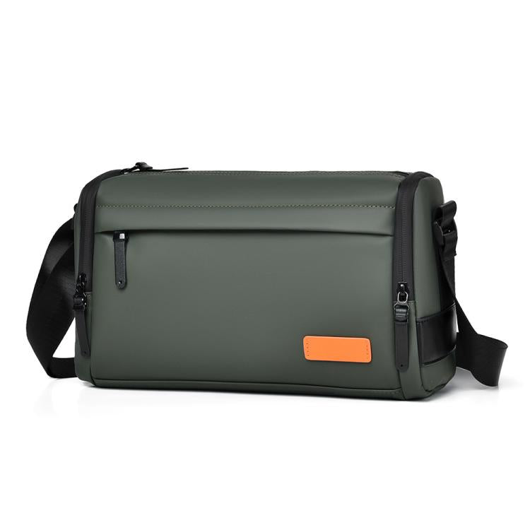 Green crossbody messenger bag with front zip pocket and adjustable shoulder strap