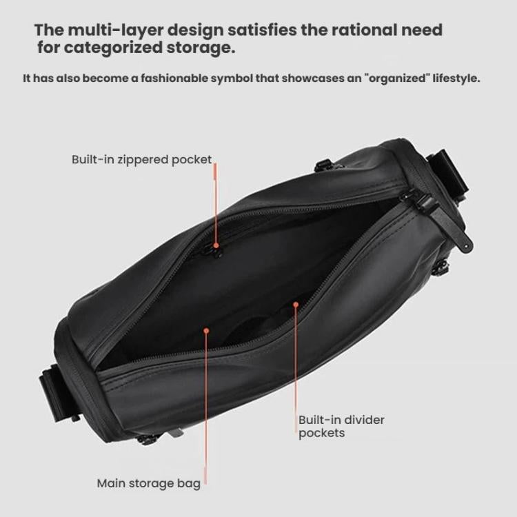 Black crossbody bag showing main compartment and interior zip divider pockets