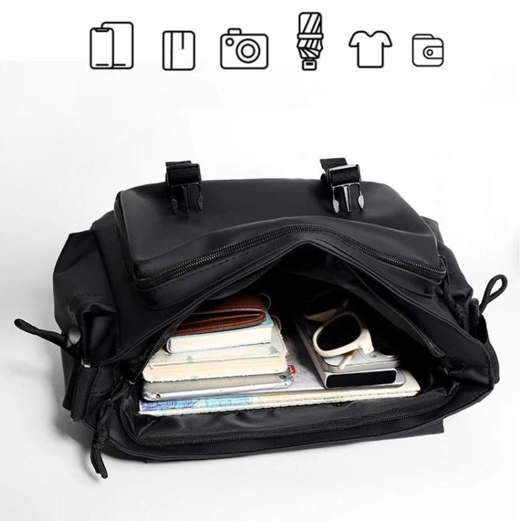 Black messenger bag interior open view with zip pocket and document-sized compartments