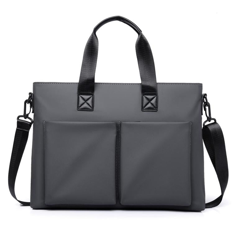 Men's waterproof laptop messenger bag in black with dual front pockets and side carry straps