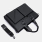 Men's waterproof laptop messenger bag in black with top flap, handle, and crossbody strap