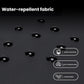 Water-repellent fabric close-up with water droplets on dark material