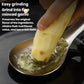 Manual ginger garlic grinder spoon mashing minced ginger and garlic in a bowl