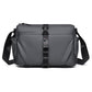 Men's gray sling bag with magnetic front buckle and adjustable shoulder strap