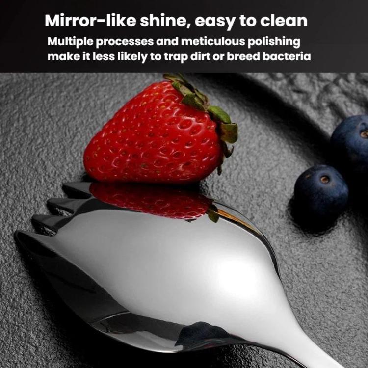 Stainless steel spoon with mirror-like reflective surface and scalloped edge.
