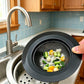 Black sink strainer with wide rim and perforated stainless mesh basket