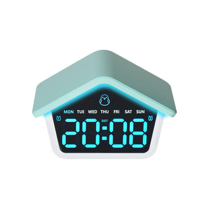 House-shaped digital alarm clock with blue LED time display and teal night light glow