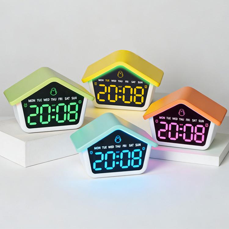 Set of house-shaped digital alarm clocks with glowing LED time displays in multiple colors