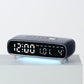Deep blue digital alarm clock with date, weekday, temperature, and time display on front