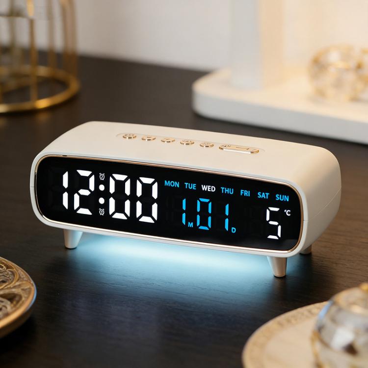 White digital alarm clock with large time and weekday display on front