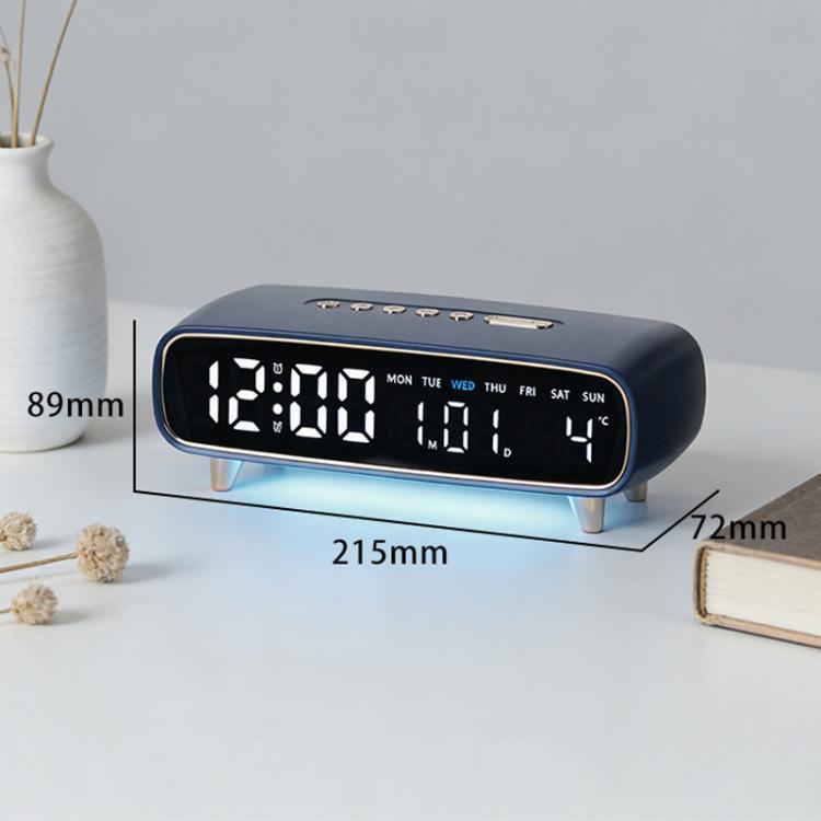Dark LED digital alarm clock display with weekday and temperature