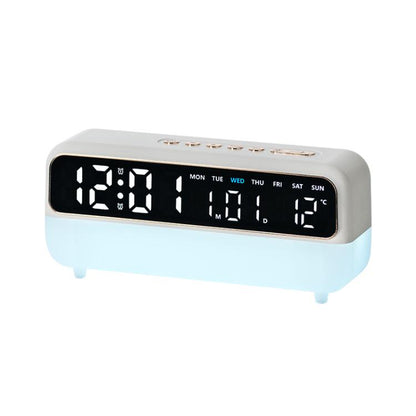 White digital alarm clock with large LED time display and night light base