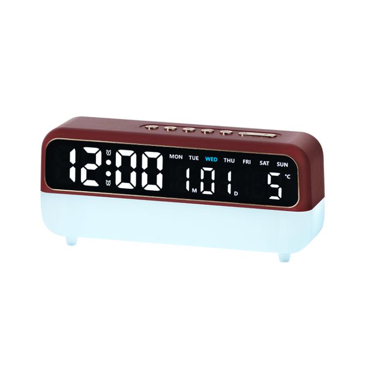 Red digital alarm clock with large LED time display and night light base