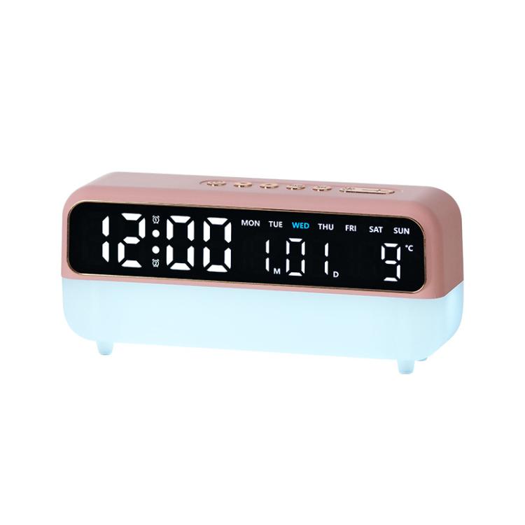 Pink digital alarm clock with large LED time display and night light base