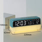 Blue digital alarm clock with LED time, date, temperature, and weekday indicators