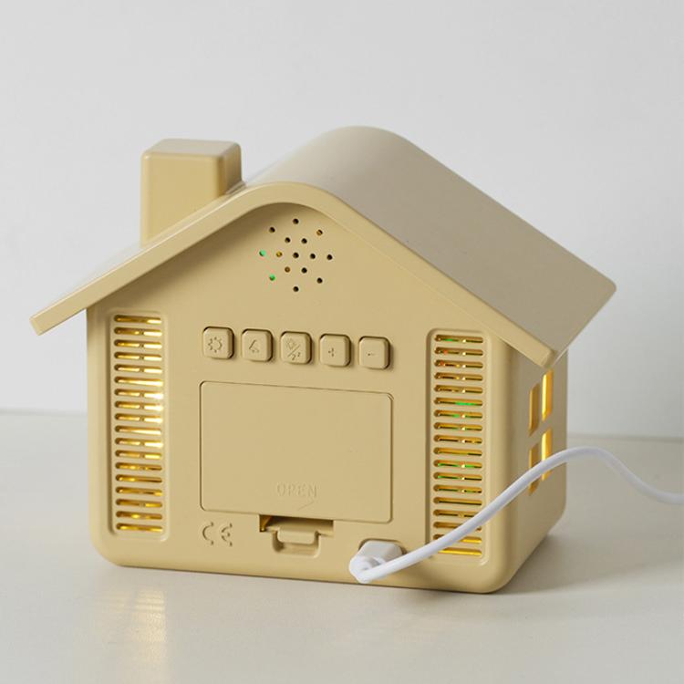 Yellow house-shaped digital alarm clock back view with button panel, vents, and power cable