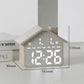 Gray house-shaped digital alarm clock with front display and size measurements (143mm)