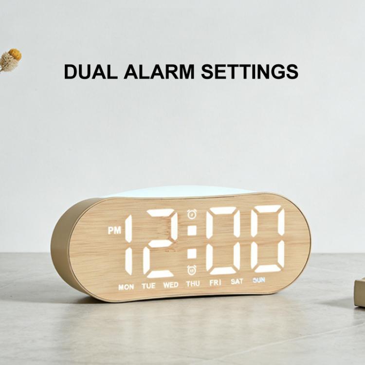 Digital alarm clock with white LED time display and wood-grain casing