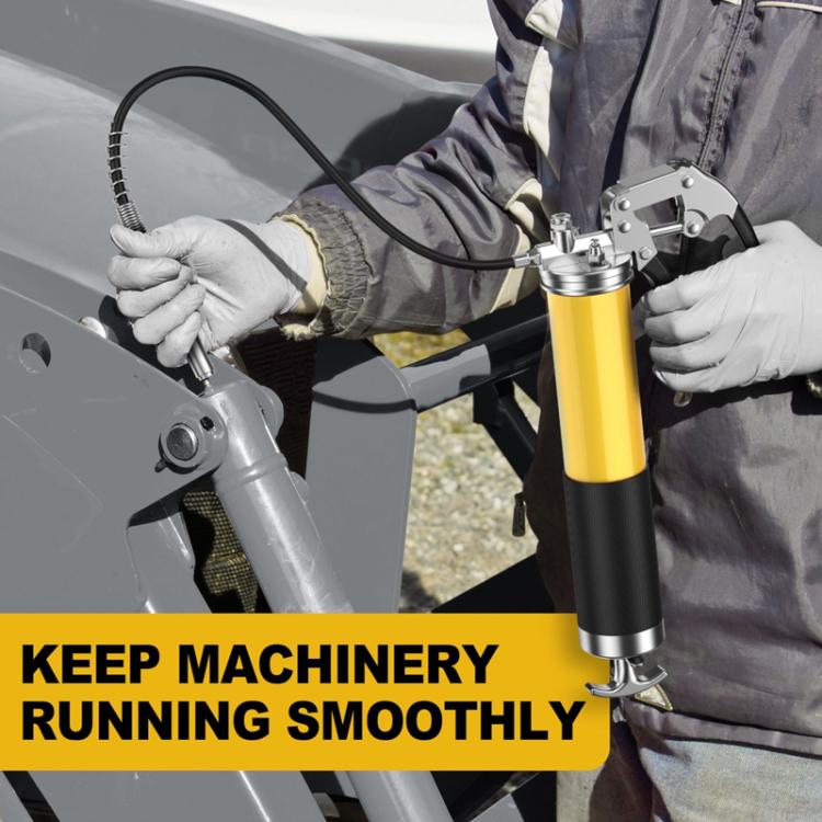 Portable lubricant filler dispensing at vehicle grease fitting with yellow pump and hose
