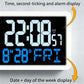 Digital wall clock display showing seconds, alarm, and date/day of the week.