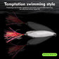 Silver fishing spoon lure with long colorful feather skirt and treble hook