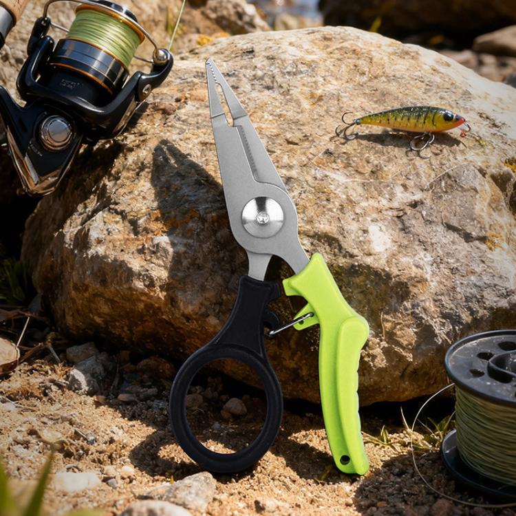 Compact fishing scissors/pliers with lime green handle, black finger loop, and metal cutting jaws